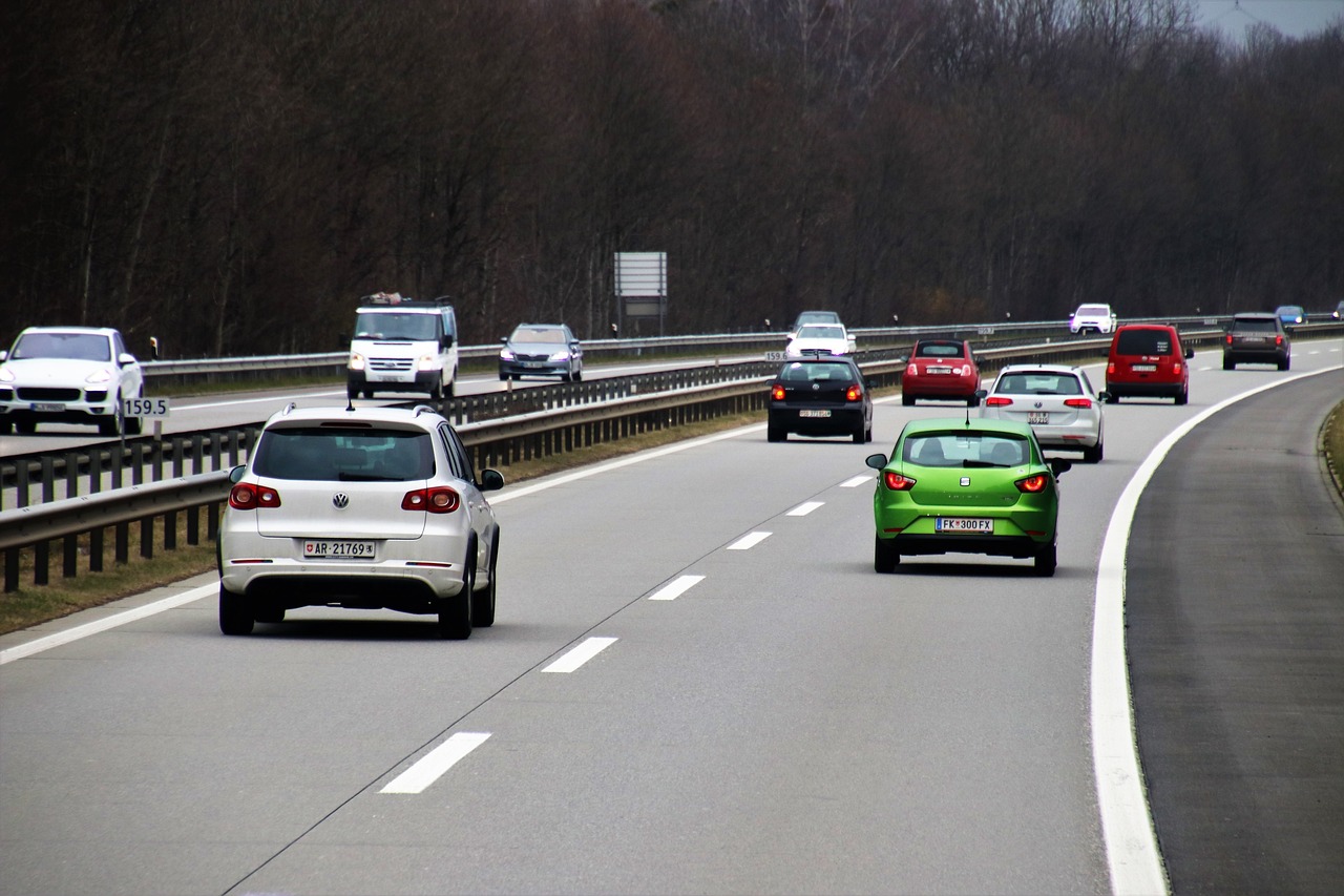 a group of cars driving down a highway, by Cornelisz Hendriksz Vroom, flickr, hannover, renault ultimo, modern high sharpness photo, green tonalities