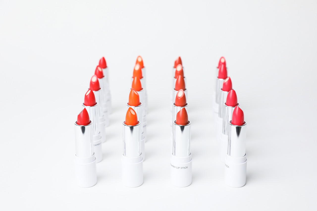 a group of lipsticks sitting on top of each other, by Gavin Hamilton, bauhaus, orange and white color scheme, tokujin yoshioka, product introduction photo, gradient white to red
