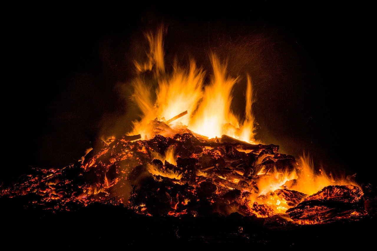 a pile of wood burning in the dark, a picture, by Rodney Joseph Burn, pixabay, baroque, wings of fire, concert, facebook post, lava erupting