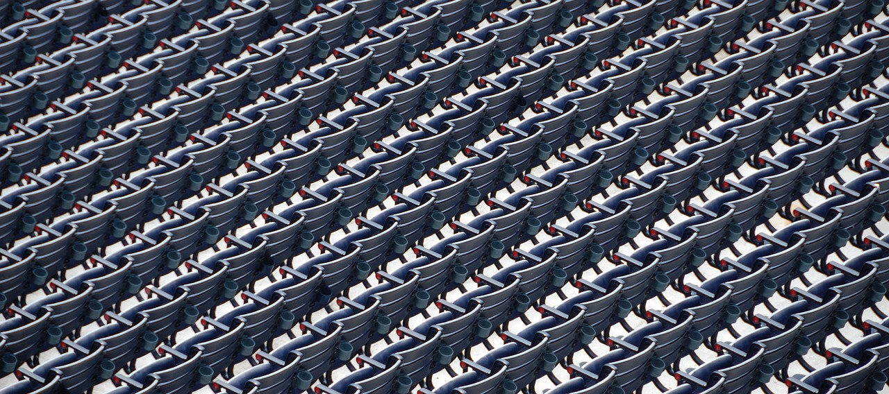 the seat covers on many rows of stadium seats