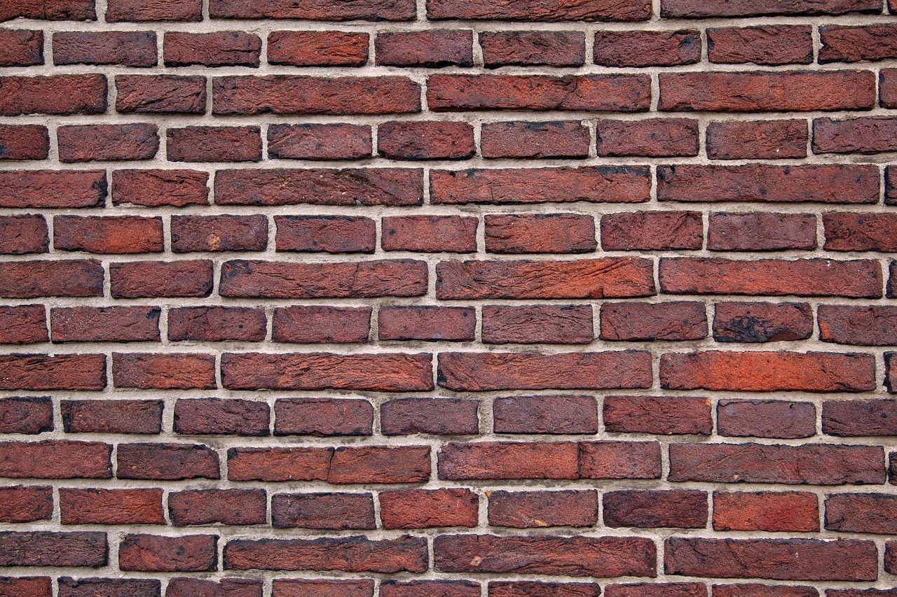 a red brick wall that appears to be made of bricks