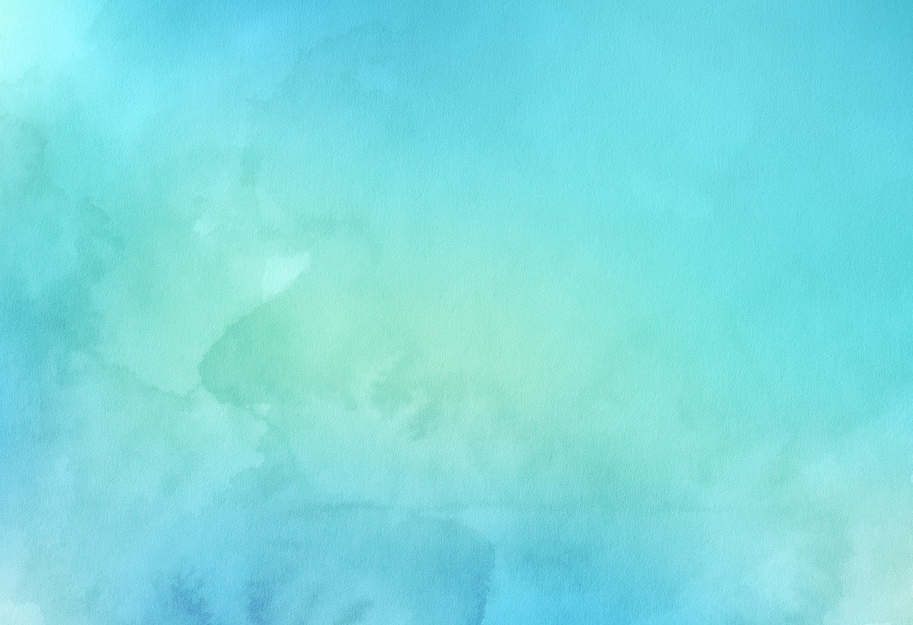 an abstract blue and green background with lots of paint