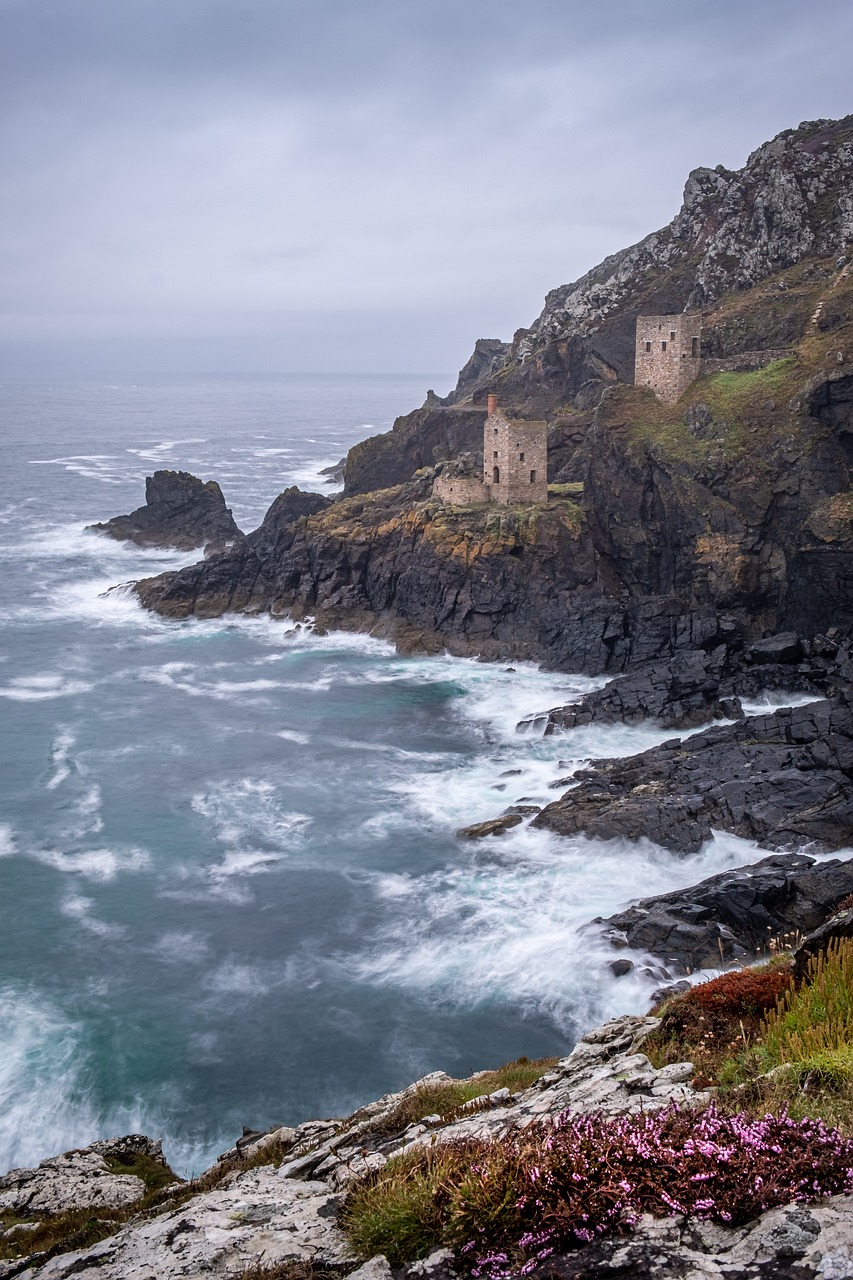 the cliff is on one side and above it, there is the ocean and rock formations