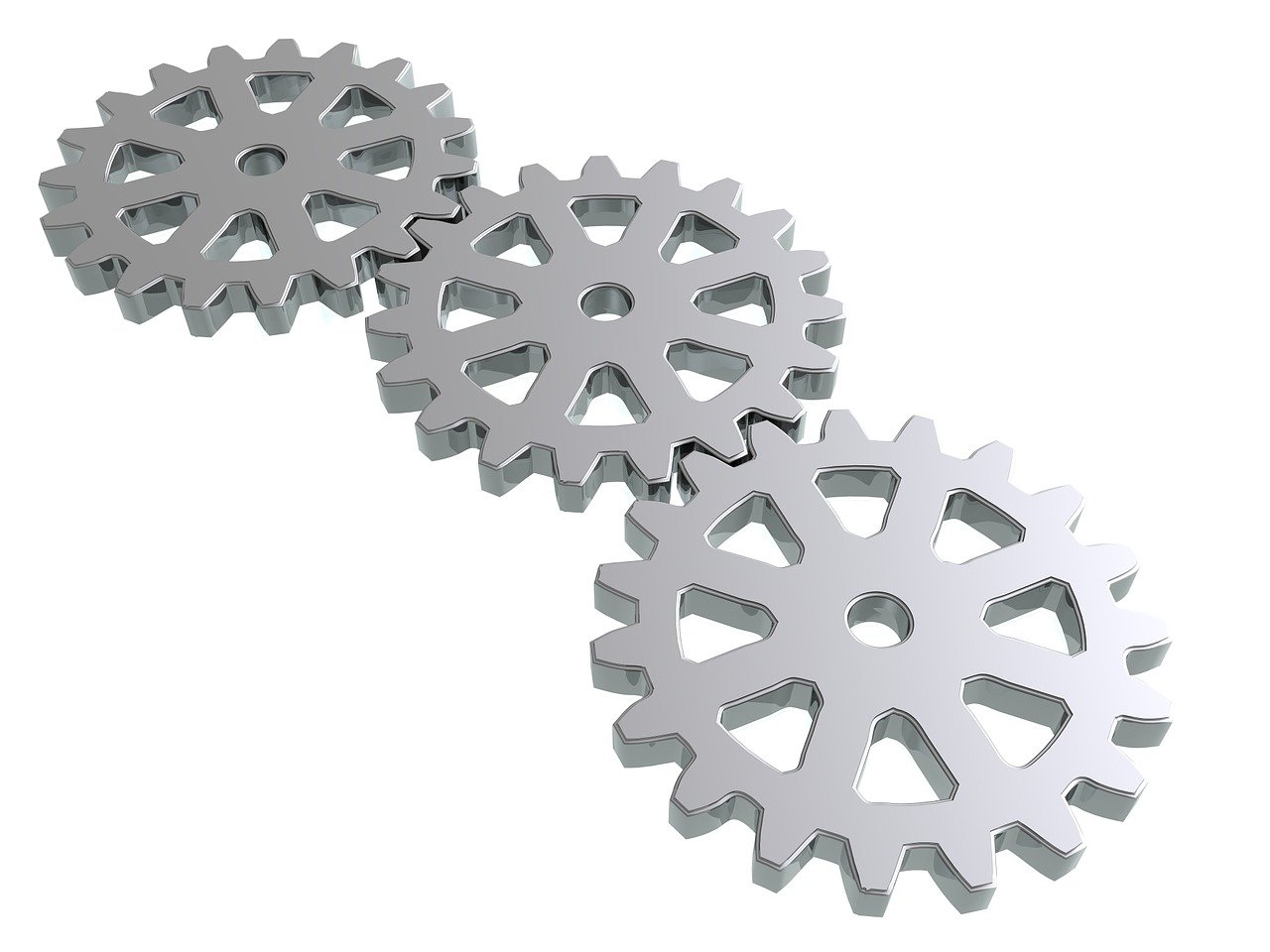 two silver gears that are next to each other