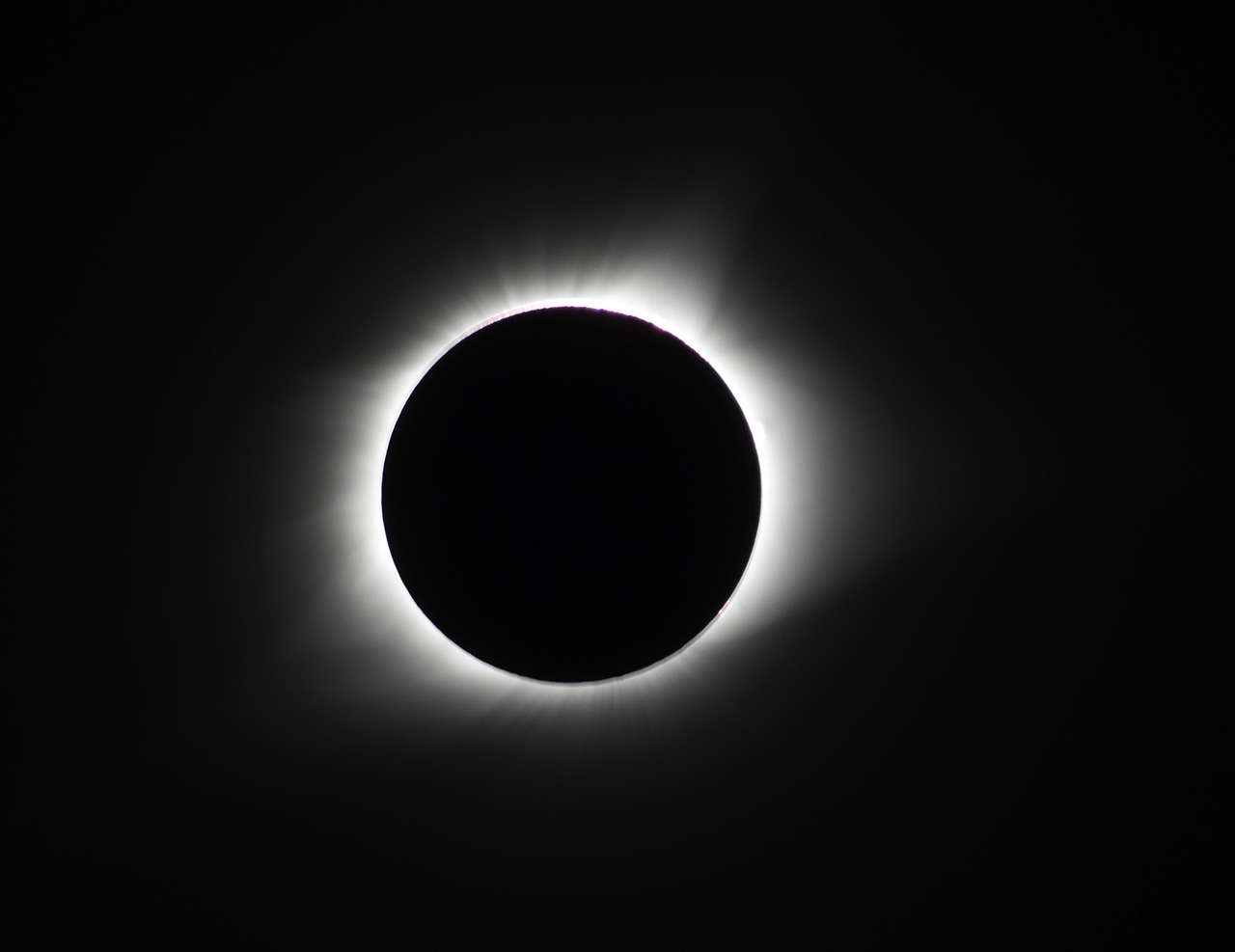 the sun is seen in front of a solar corona