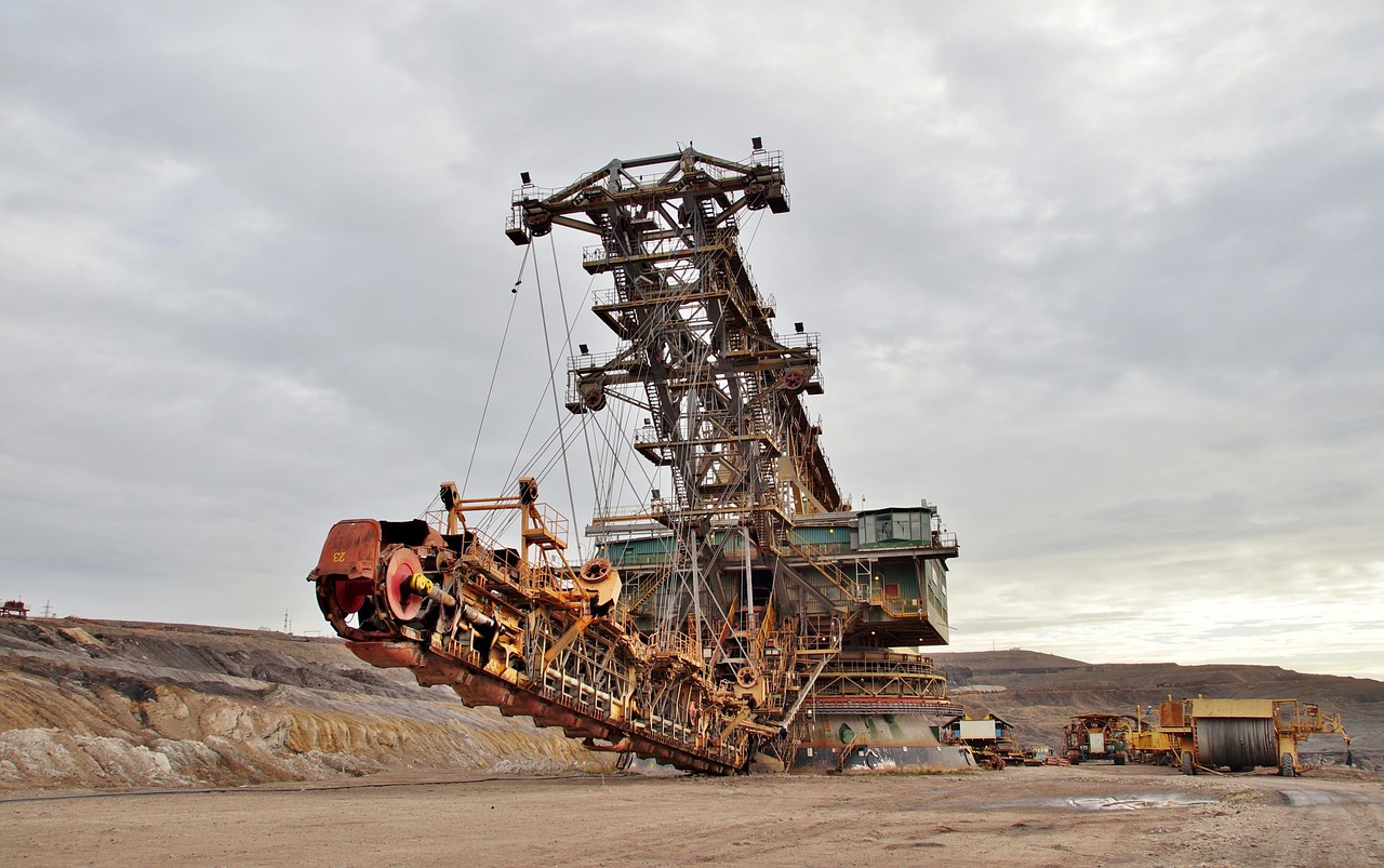 a large metal crane attached to the side of a building