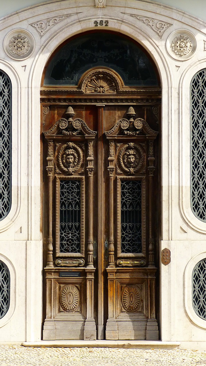 a pair of wooden double doors that are open