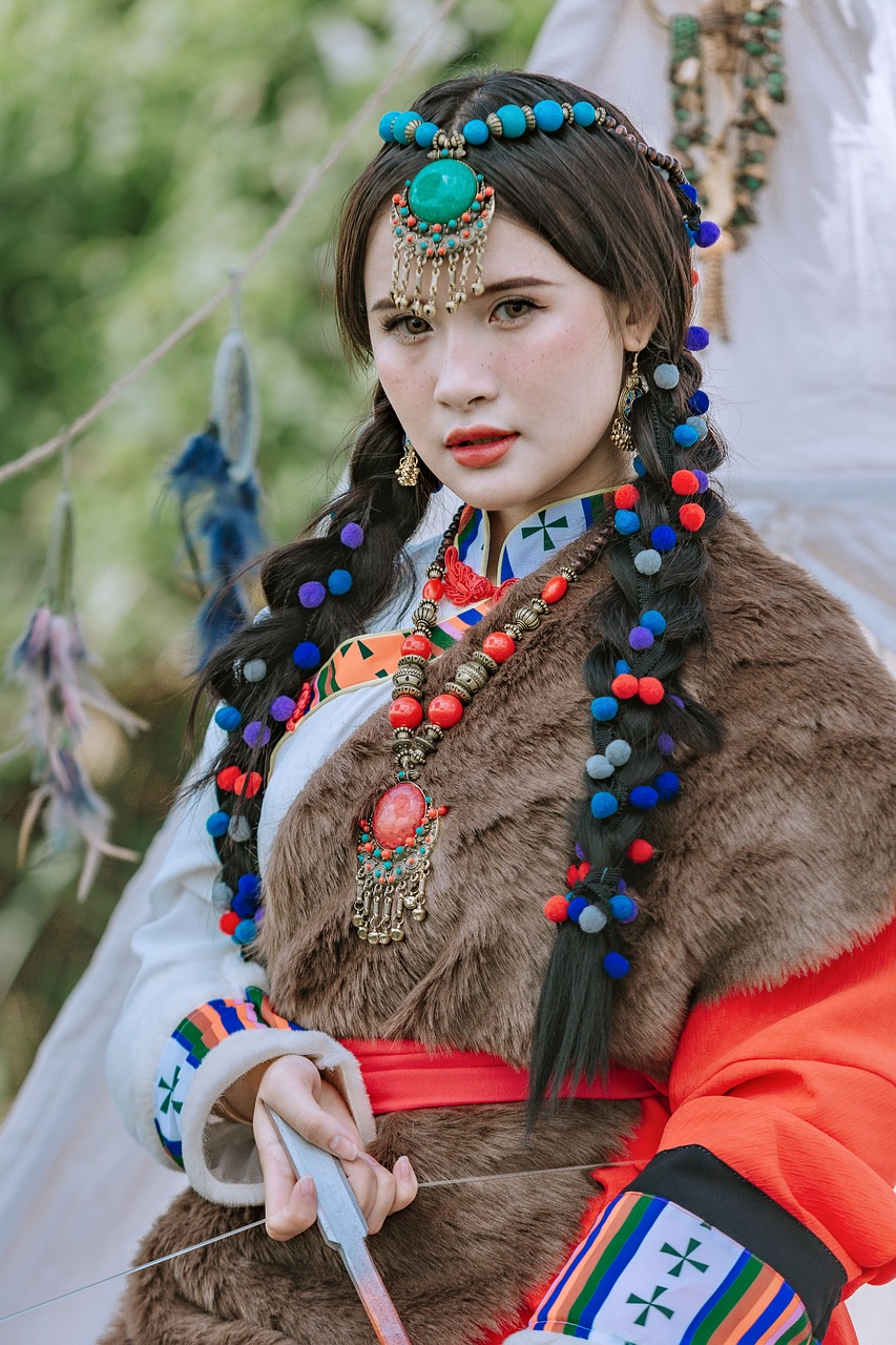 a woman wearing an animal vest and headpiece