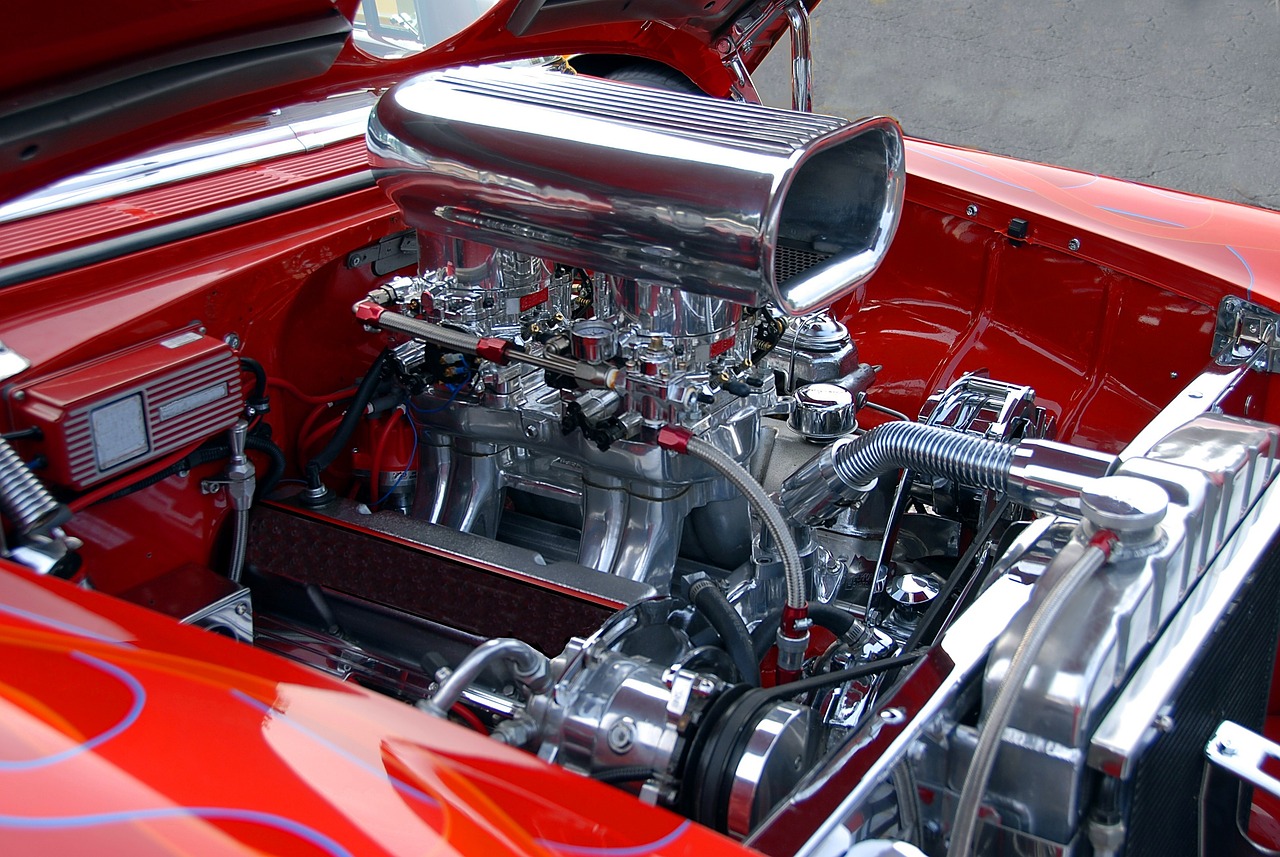 the engine of an old school  rod sports car