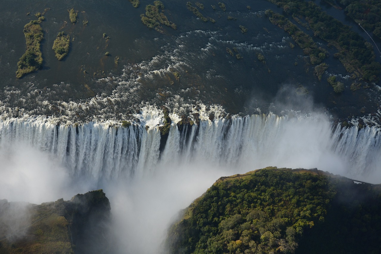 the water falls appear to be flowing out of the ground