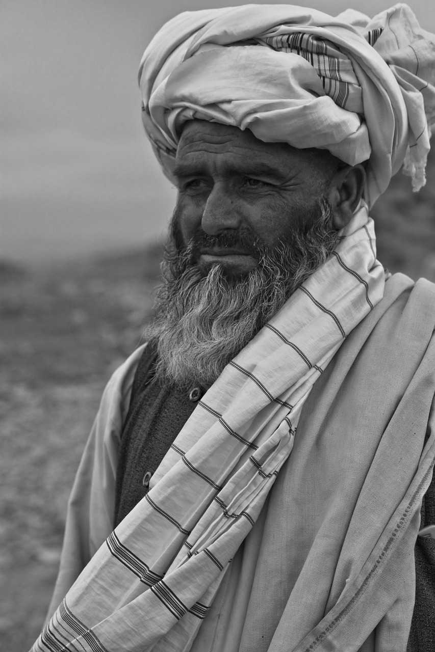 black and white pograph of an indian man with a beard