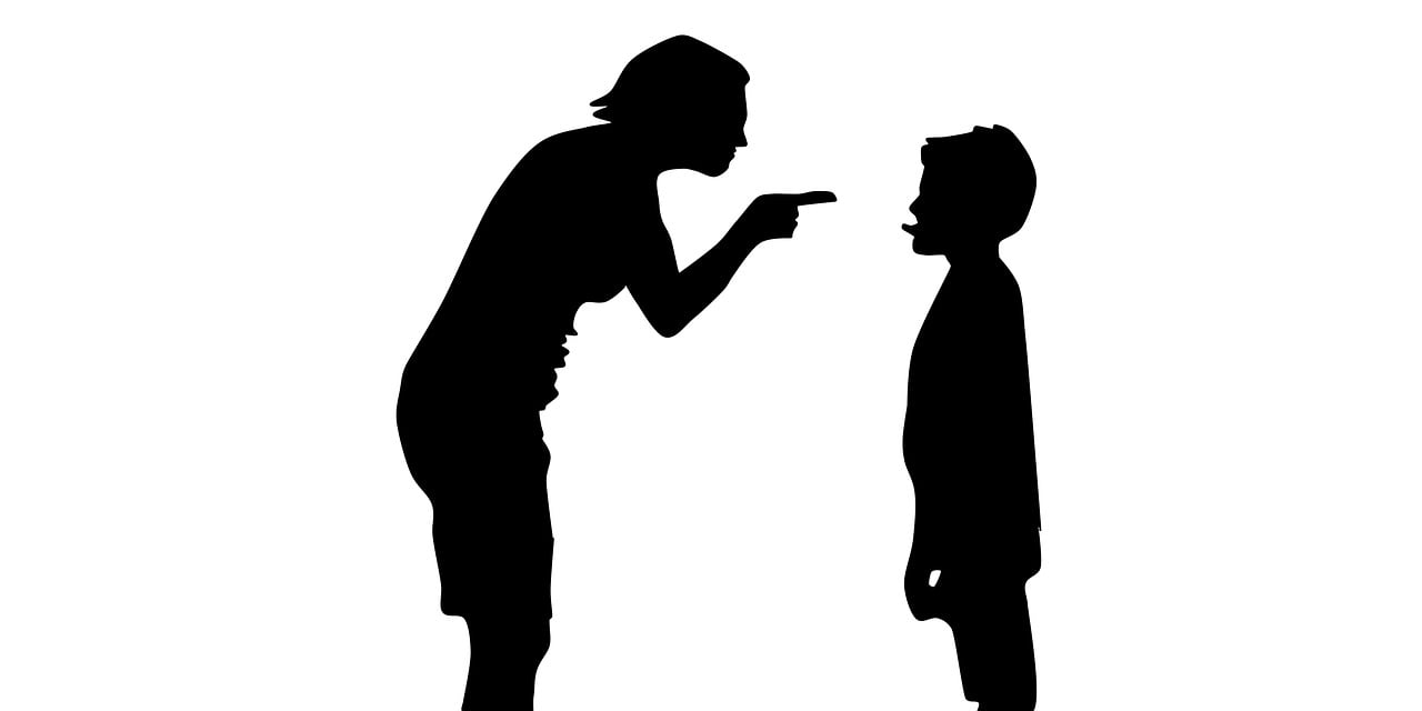 a silhouette of two children talking to each other