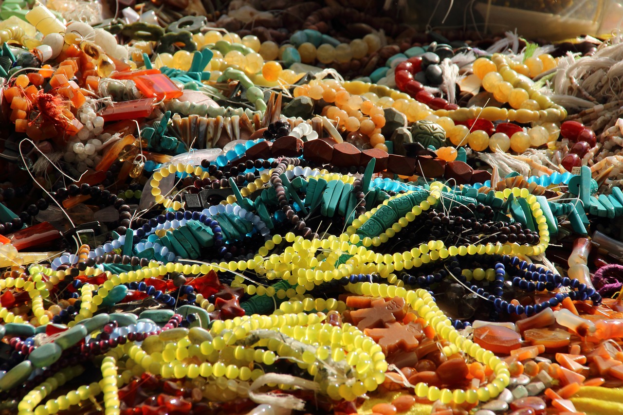 the assortment of different colored bead celets