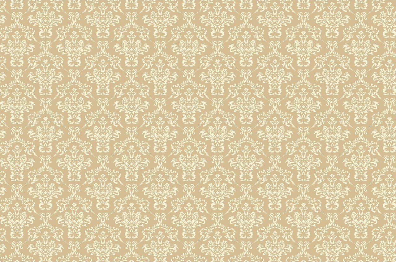 a beige and white wallpaper pattern