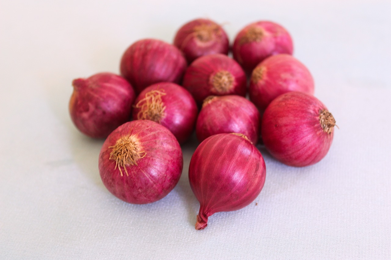 a pile of onions are shown on the counter