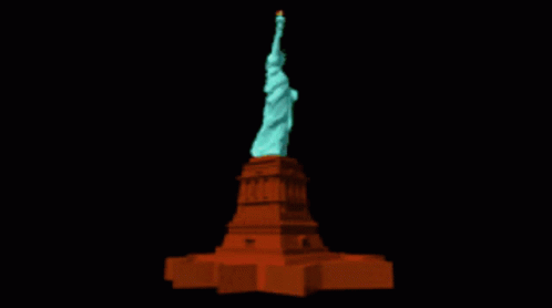 a large blue and yellow statue of liberty is shown