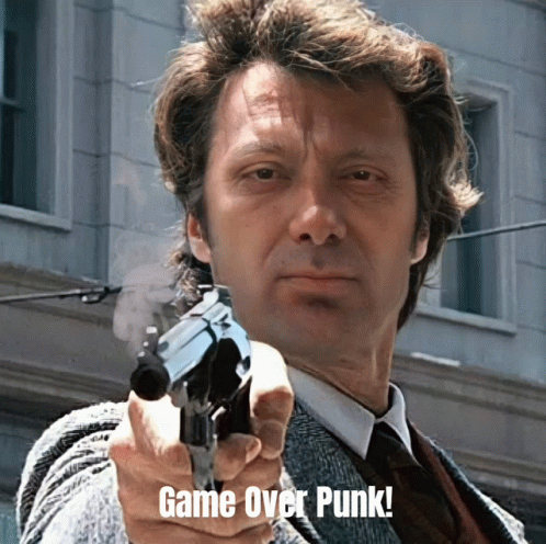 a man holding a gun with the words game over punk