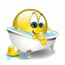 a small cartoon character is taking a bath with his tongue out
