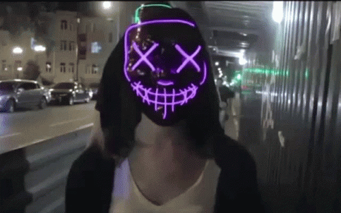 a person wearing a mask in the street