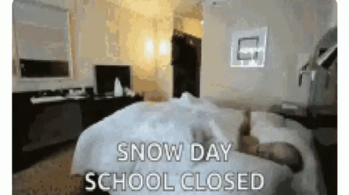 a blurry po of someones bedroom with snow day school closed
