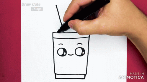 someone's hand is drawing a glass of liquid