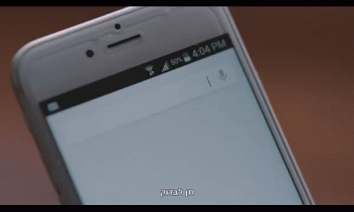 an old image of a cell phone on top of the screen