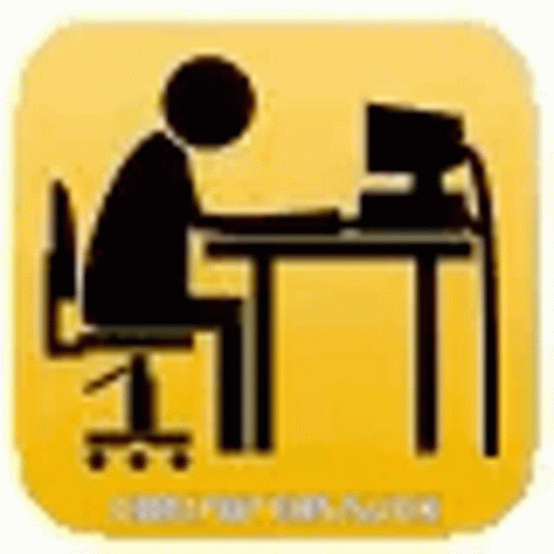 a stick figure sitting at a computer on a desk