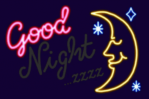a neon sign that says good night on the side