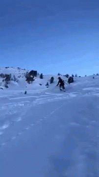 the skier is skiing on the snow alone