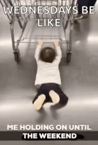 a woman has her legs up in the air as she stands on her knees next to a shopping cart