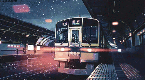 a bus is at the station under a night sky