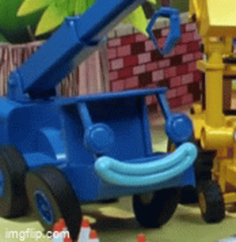 there are toys of construction, including a crane, banana, and some construction equipment