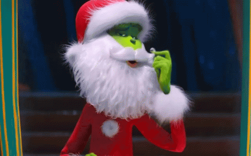 a digital image of an animated green man dressed as santa