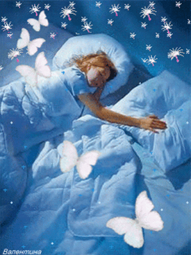 the blue woman in bed is adorned with white erflies