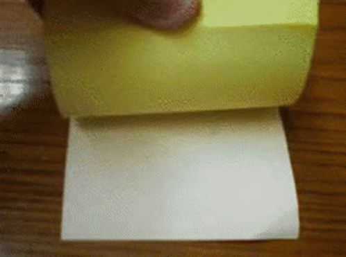 a hand pressing a green and blue on