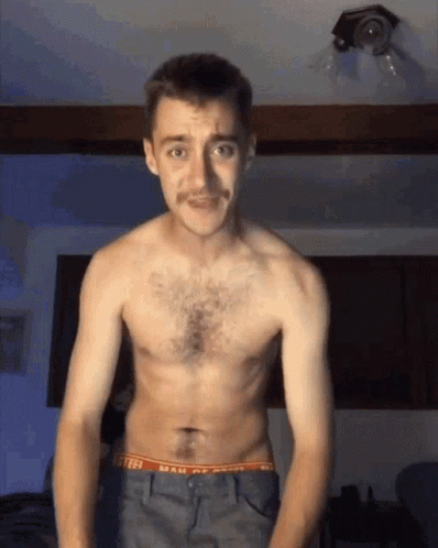 a young man in his underwear, has a mustache