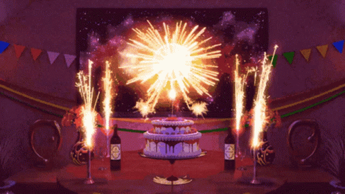 a cake decorated with fireworks and decorations