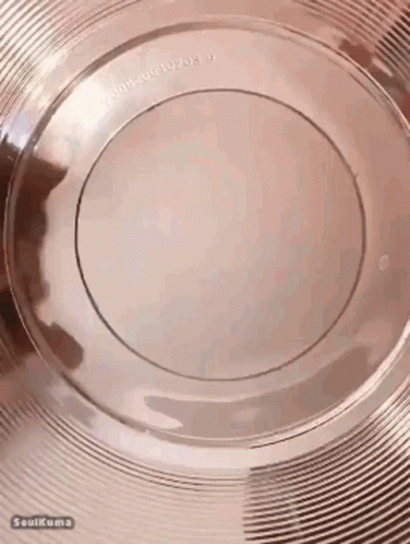 close up of a large, shiny silver bowl