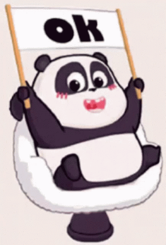 a little panda holding a sign on top of a white pole