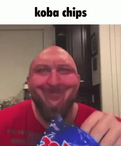 a man holding up a bag of food with koba chips in it