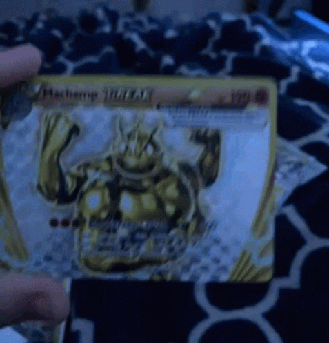 a person holds up a card with a picture of a frog on it