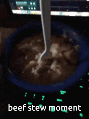 a spoon is sticking out of a bowl