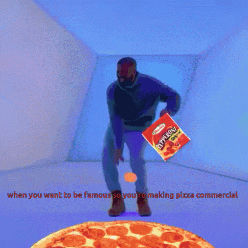 man standing on floor with pizza under feet
