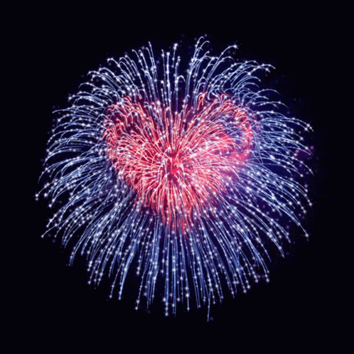 a purple colored fireworks with lots of sparkle