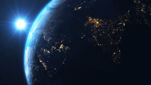 the earth is illuminated by a bright sunlight from space