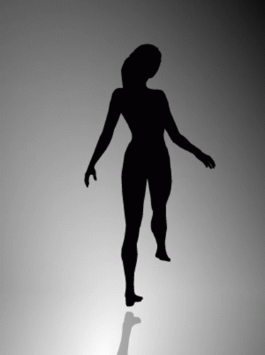 silhouettes of women walking on light floors