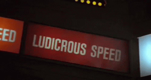 a sign at the entrance of a speeding speed