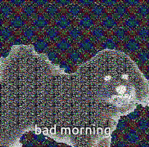 a black and white dog with the word bad morning
