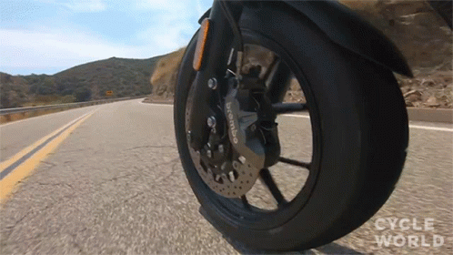 the view from the front tire of a motorcycle