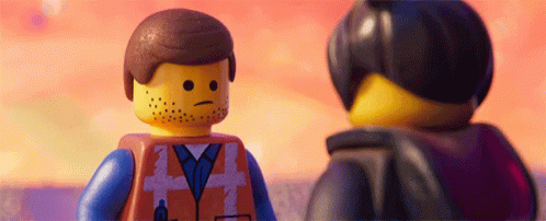 a lego figure is staring into another character